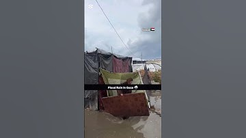 "Heartbreaking Rain 🌧️ Floods Gaza: A Displaced Woman