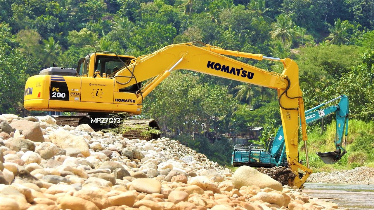 Excavators Working Digging The River Flows Komatsu PC200 Kobelco SK200 ...