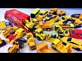 Yellow minicar rides on the trailer/excavators, bulldozers, tippers 黄色い車のおもちゃがトレーラーに乗る