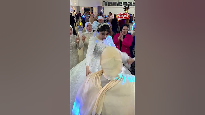 رقصوا فى حضن أمهم!.. عروستين توأم اتجوزوا فى نفس اليوم: شكلهم يفرح!