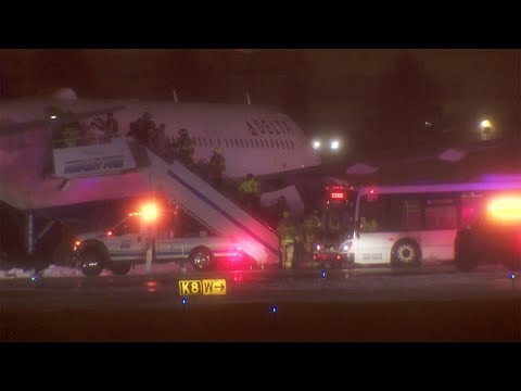 Stuck plane at MSP Airport during snowy night
