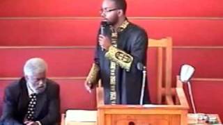 Pastor Willie Carrington preaching God Loves You.