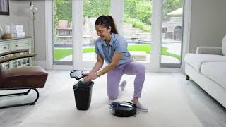 How do I maintain the dust bin and filter on the Shark IQ Robot™?
