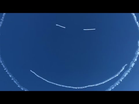 Massive smiley face appears in the sky drawn by a plane