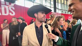 On 2024 CMT Awards Red Carpet, Dustin Lynch talks new album and inspiration behind it