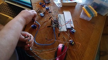Arduino turnout control with servos and push buttons.
