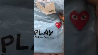 Quick look at a Comme des Garçons Play T-shirt.  Baby blue.  Really nice tee.  Sizing advice!