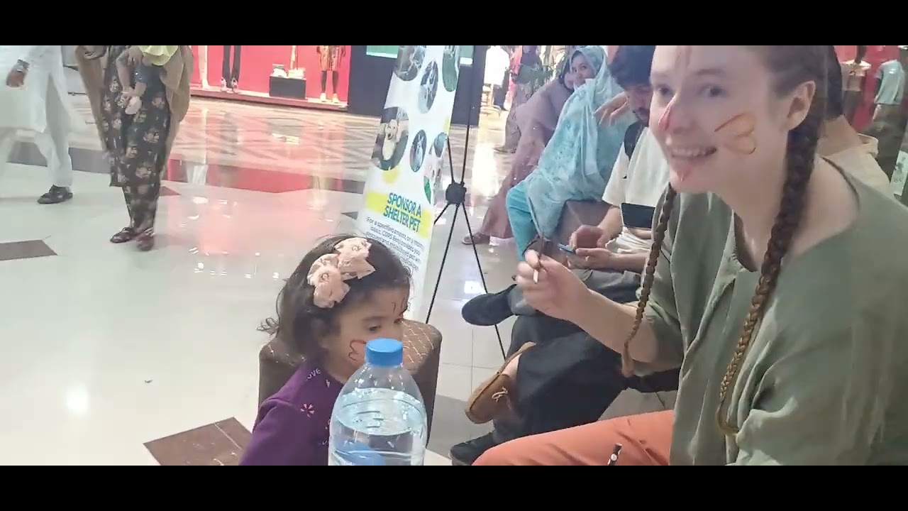 Stunning Dutch lady make art 🎨 on cute baby face. 