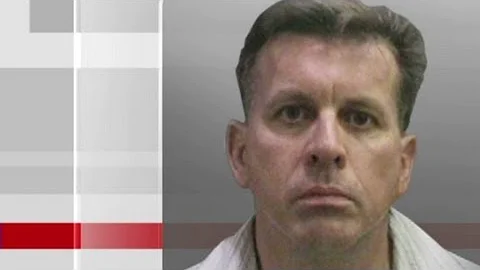 Professor accused of setting fires at late son's school