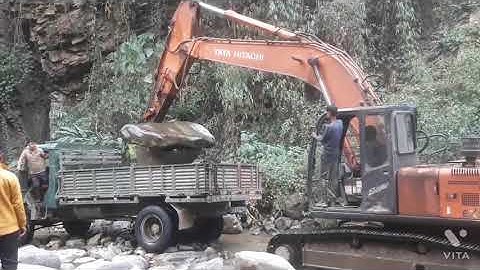JCB Loading a big Rock # A skilled Driver#