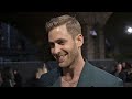 Oliver jacksoncohen chats about playing weightman in emily 2022 at the movies london premiere
