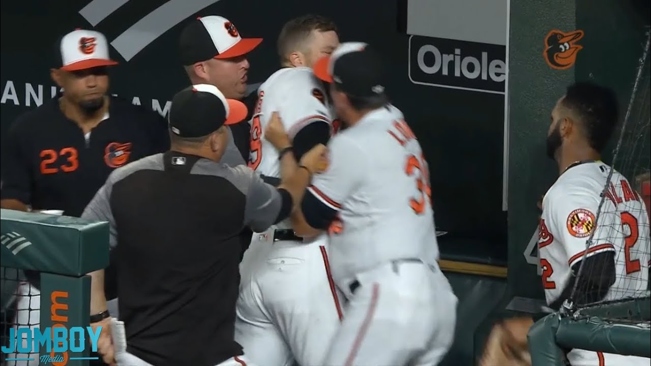 Chris Davis and Brandon Hyde go at each other in the dugout, a