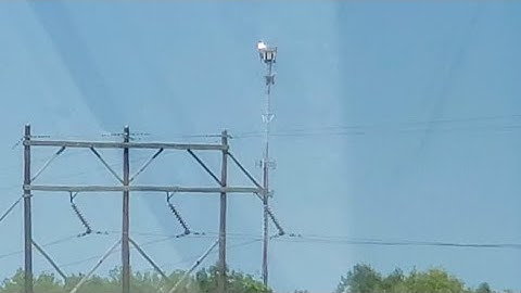 Cool red and white cell tower with it