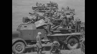 Mobile Flak gun crews training in the engagement of ground targets in 1943