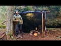 Building bushcraft shelter under a huge rock  collecting birch sap making fish trap catch  cook