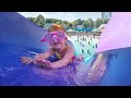 Kids Play at Ultimate Water Park!! Adley learns to water slide and Niko floats around!