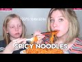 mukbangers consumin spicy noodles