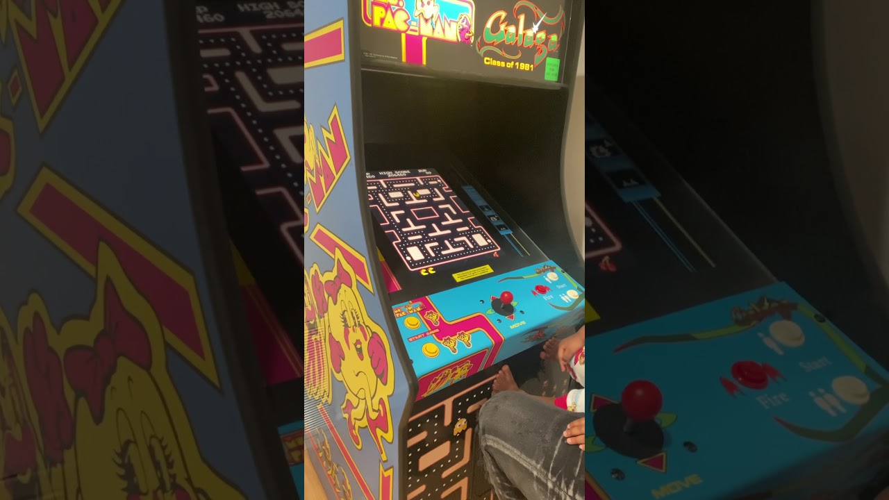 Reminisce teaching Dad how to play the video game.