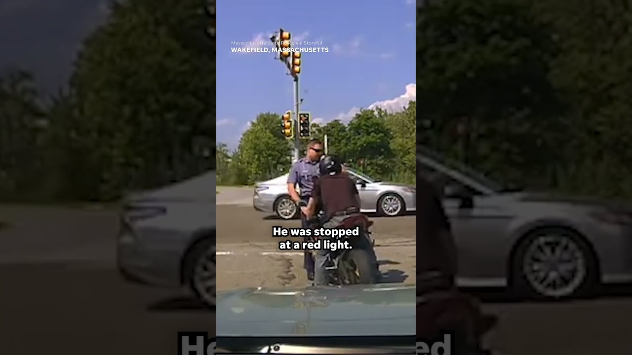 Motorcyclist Drives State Trooper Into Oncoming Traffic Shorts