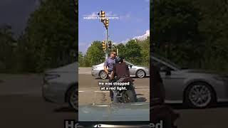 Motorcyclist drives state trooper into oncoming traffic #Shorts screenshot 2