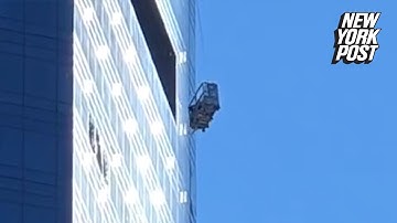 WATCH: Broken window washing rig dangles from 78th story of NYC high-rise