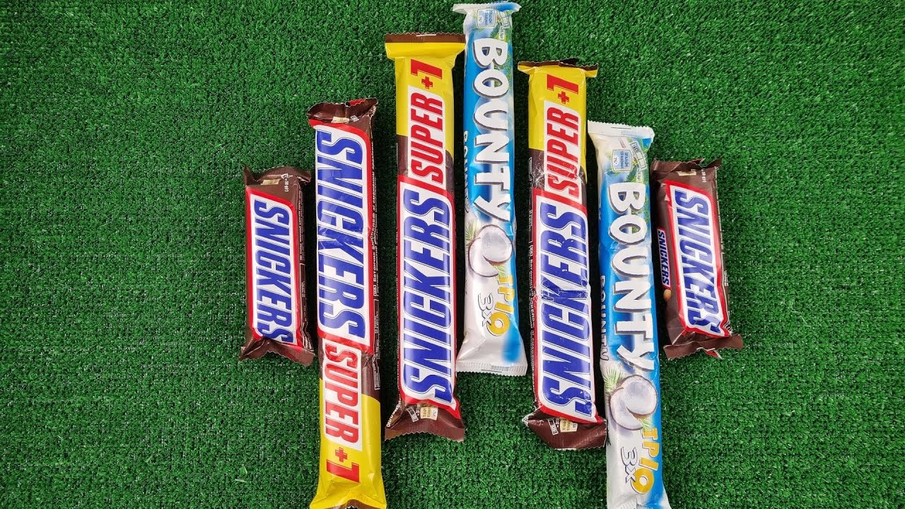 Snickers Video Satisfying video. ASMR chocolate bars Snickers and Bounty. Unpacking ...