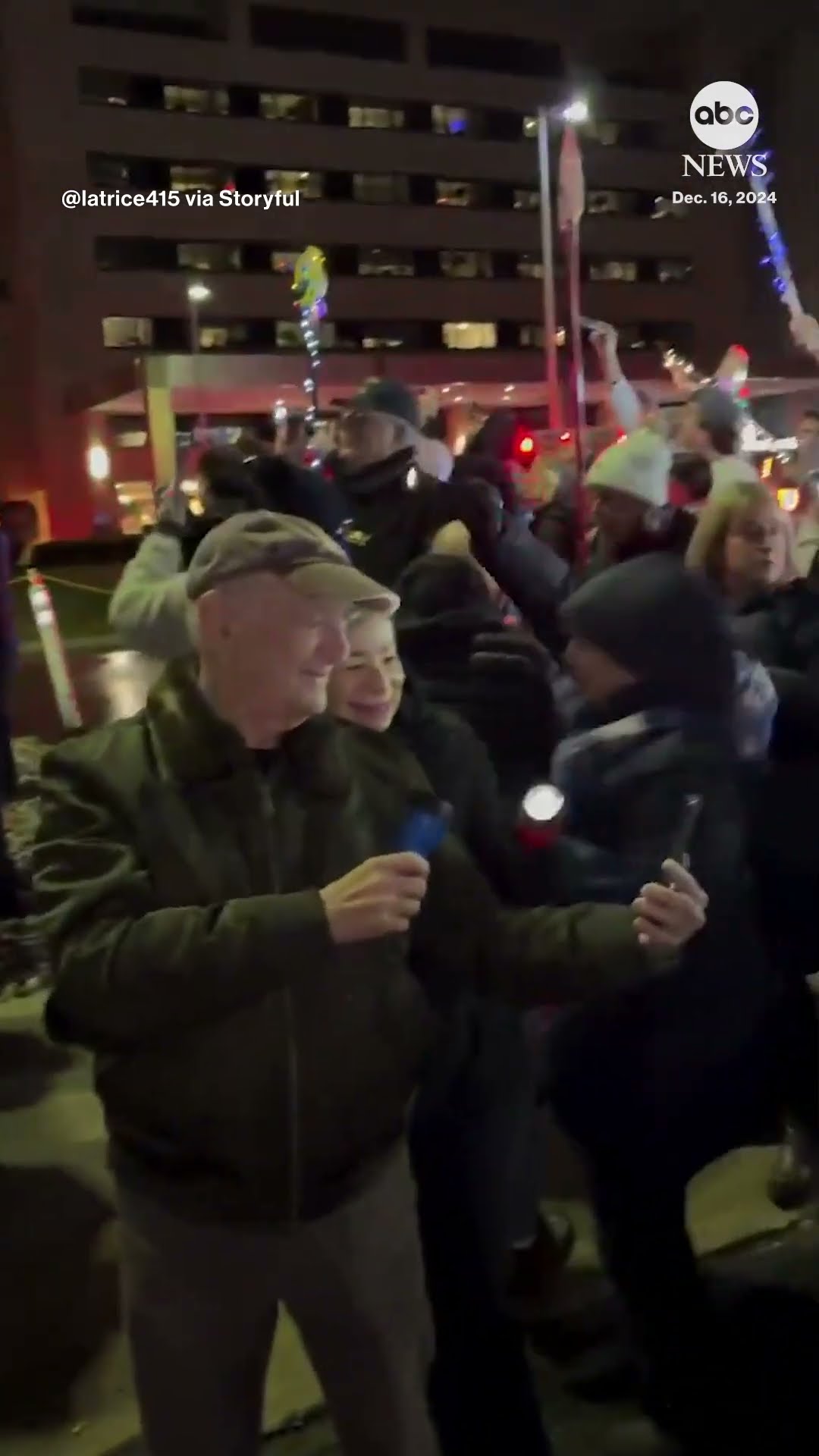 Michigan residents shine lights outside children’s hospital to bring cheer to young patients
