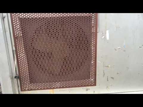 air-conditioning-condenser-fan-with-a-decorative-cover