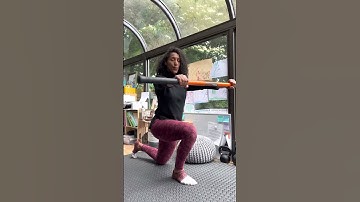 1/2 kneeling Thoracic Rotation with stick mobility