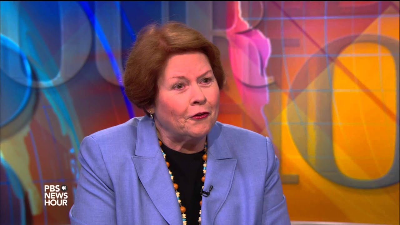 Justices rule on headscarf case, threatening speech online