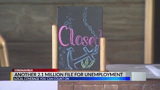 Another 2.1 million Americans file for unemployment