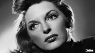Watch Julie London Saddle The Wind video
