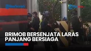 Armed Brimob Personnel on Standby Ahead of Handover of Suspect Don Ritto and Evidence to the Atto... screenshot 5