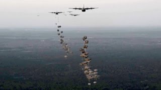 USA and British Army Paratroopers Conduct Static Line Jumps