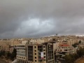 غيوم سوداء تلف العاصمة عمان - الاردن - السوسنة