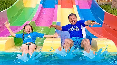 Nastya and Dad have fun at an amusement park in Ab...