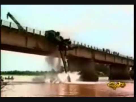 funny construction accidents--crane falls off bridge