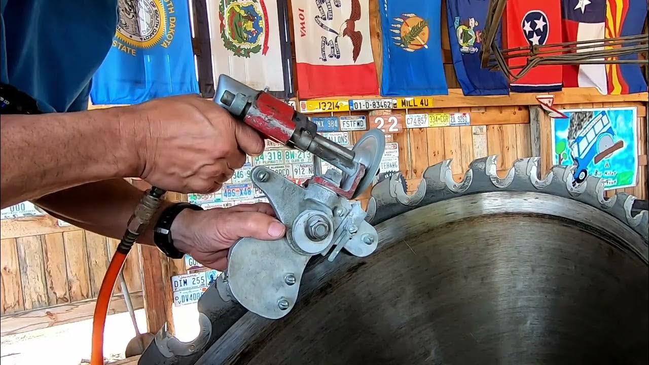 sharpening a 56 inch sawmill blade 299 YouTube