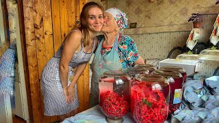 My grandmother teaches me how to make compote from berries