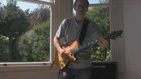 Jon Case demonstrates the Case J1 carved top guitar
