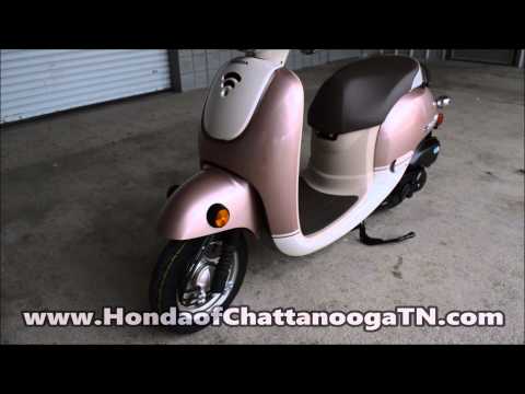 pink honda scooter