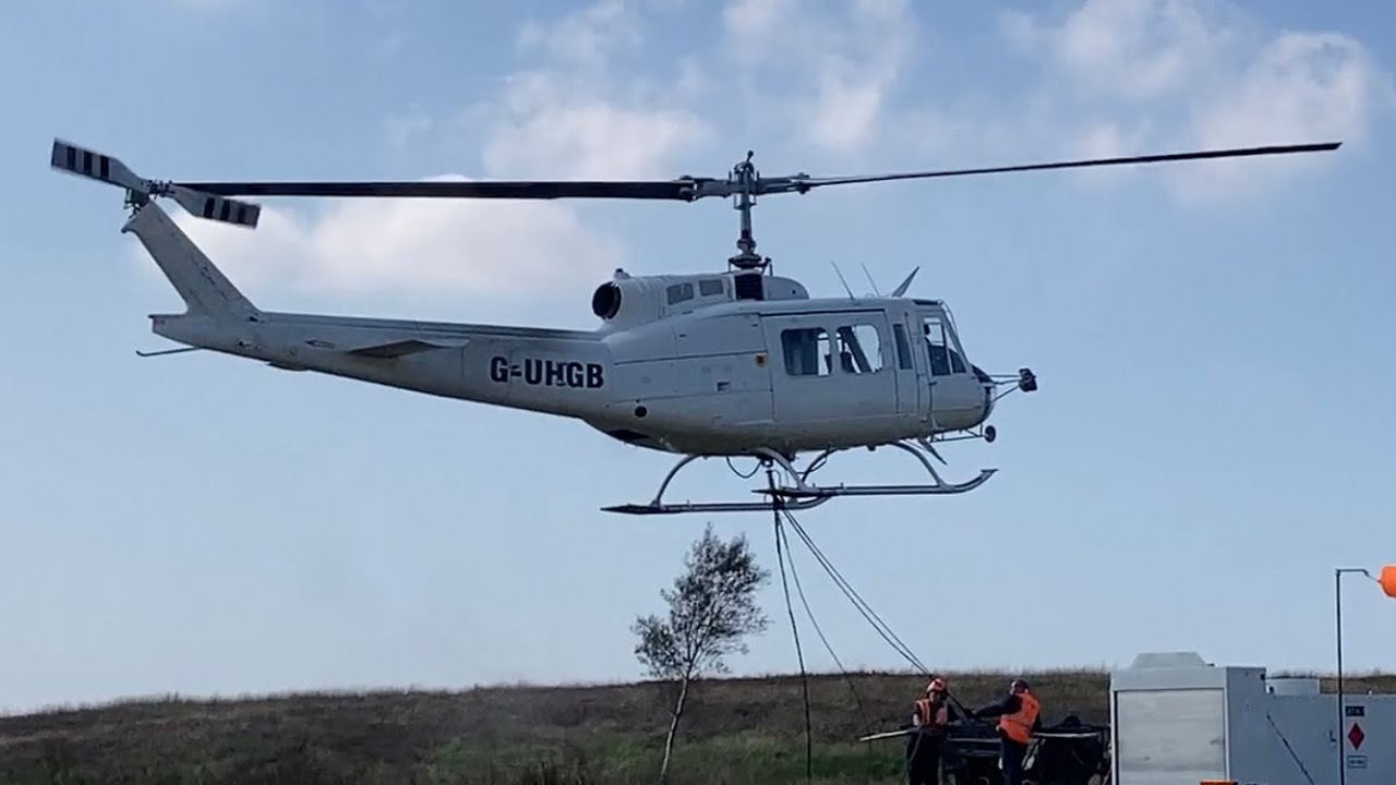 Bell helicopter flying overhead YouTube