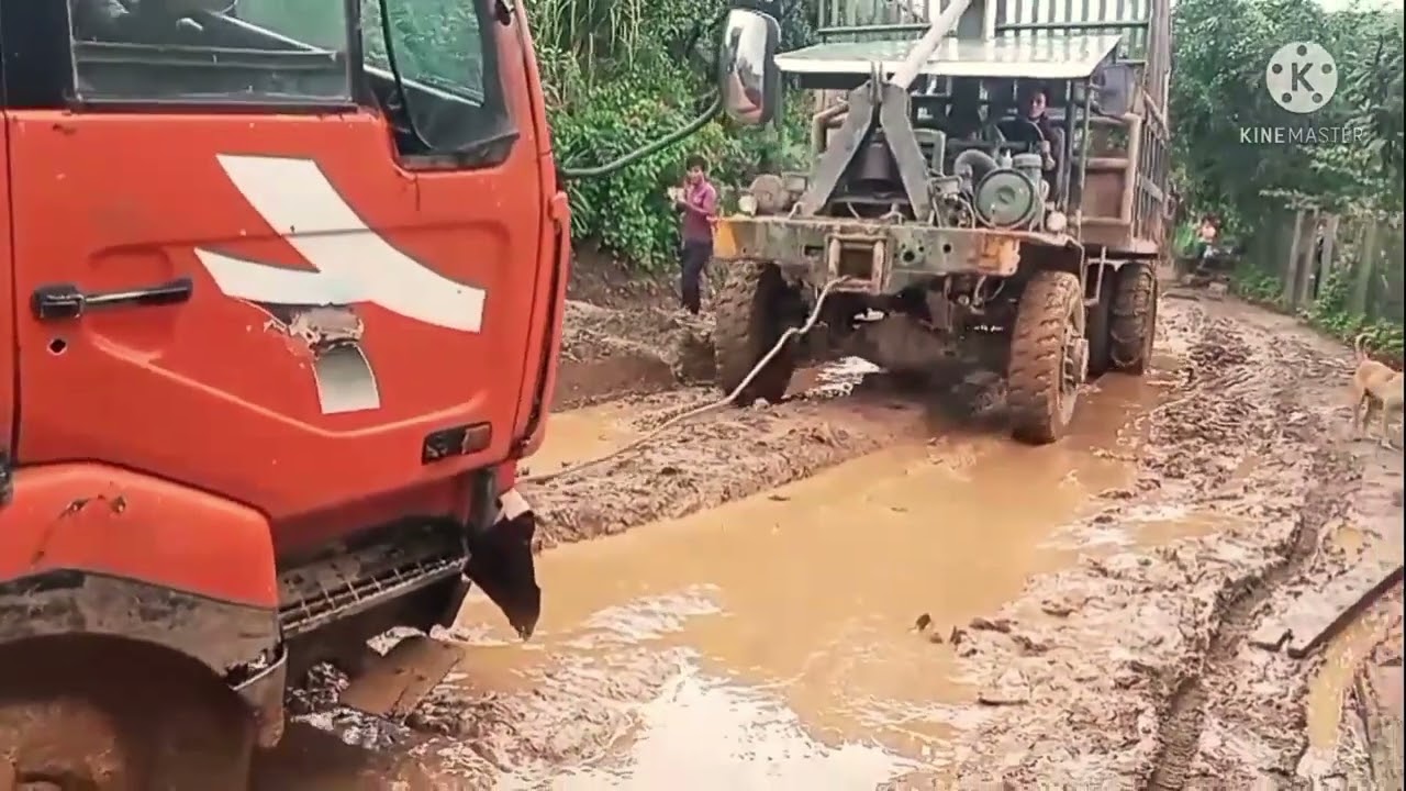 Up Close & Intense: Heavy Excavator Rescues Sand Truck Trapped in Mud”