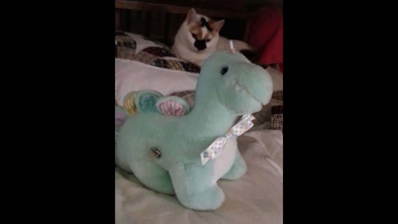A Vintage Eden Toy Musical Dinosaur Lullaby to My Cat Willow