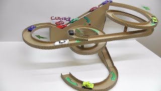 Toy track cars with their hands out of cardboard Material: cardboard, glue, slow speed motor, wheels from old toy cars, tape,the 