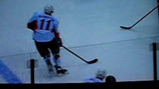 Daniel Alfredsson gets taken out by Mark Bell