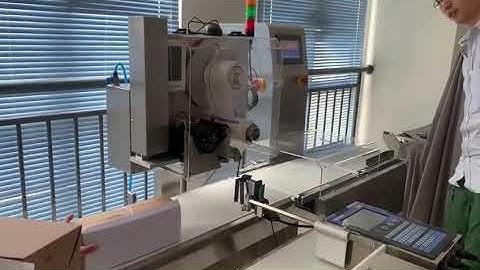 The printer is connected to the checkweigher