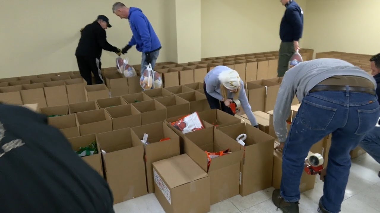 Volunteers give back Friday morning with Louisville's Boxes of Love