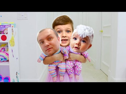 Andi found a doll and pretends to be a parent