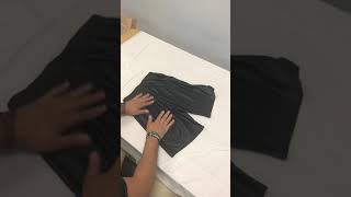 Folding shorts on a table